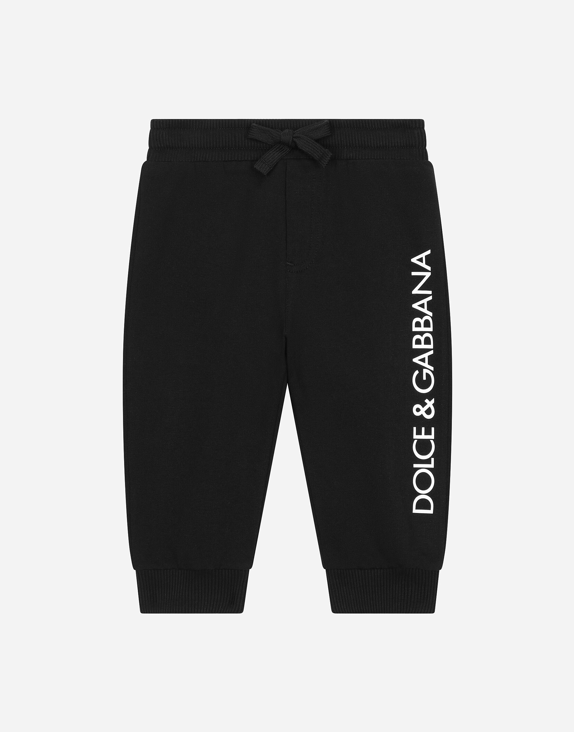 Dolce & Gabbana Pantalon de jogging en jersey à imprimé logo Imprimé L1JQT8II7EI
