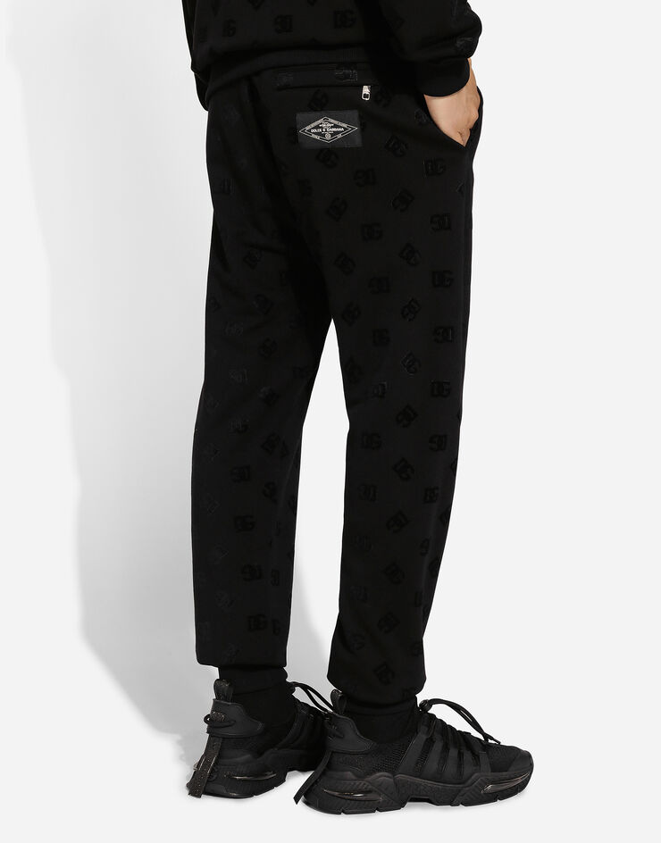 Dolce & Gabbana Jersey jogging pants with all-over DG logo print Black GV2VHTG7NWD