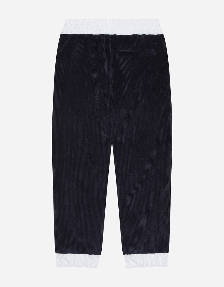 Dolce & Gabbana Pantalón de chándal de terciopelo acanalado con logotipo DG Azul L4JPJAFUWE3