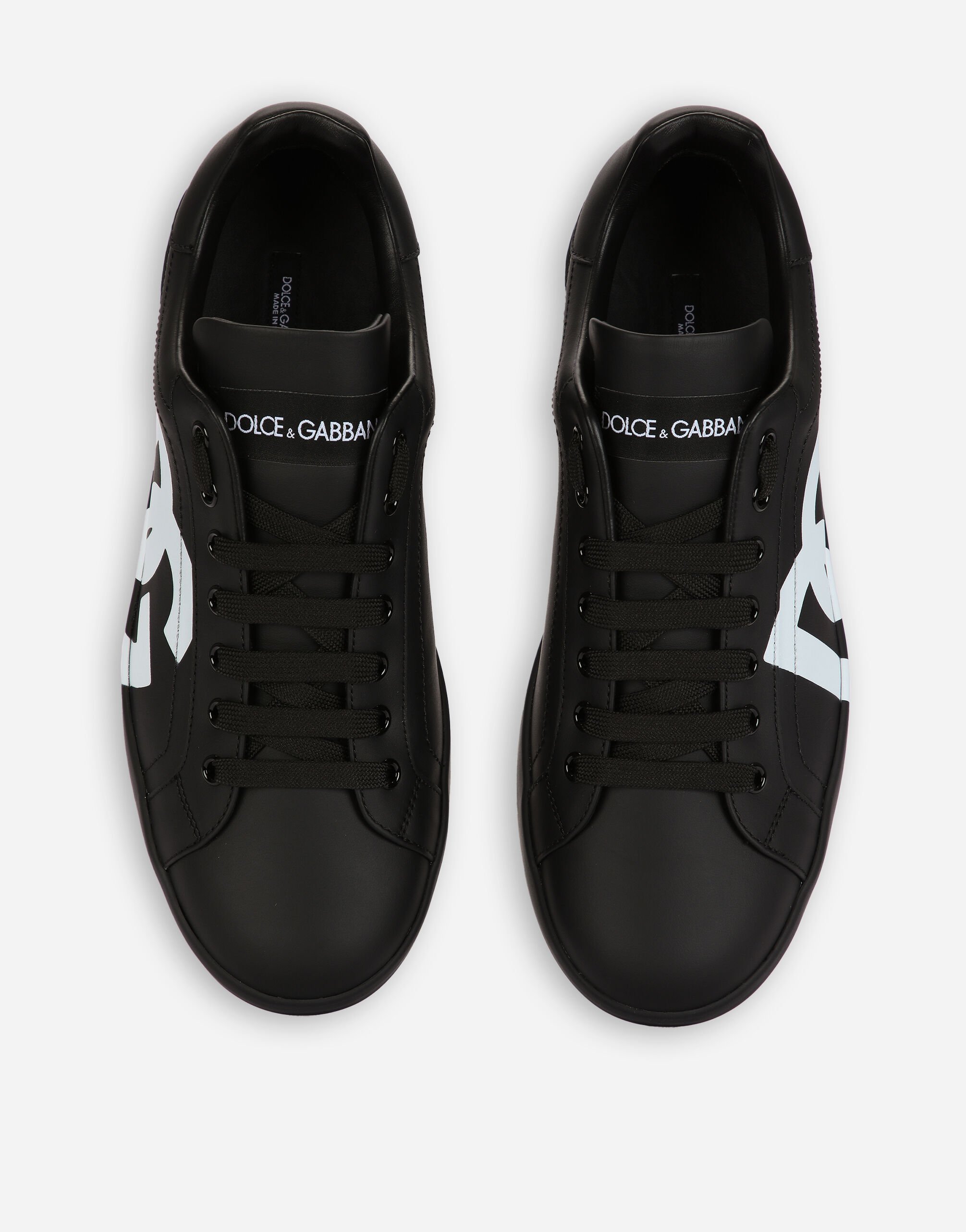 ブラックのメンズ Calfskin nappa Portofino sneakers with DG logo ...