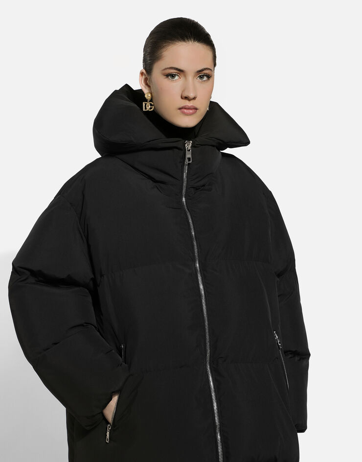 Dolce & Gabbana Long padded down jacket with branded tag Black F9S16TGDCMR