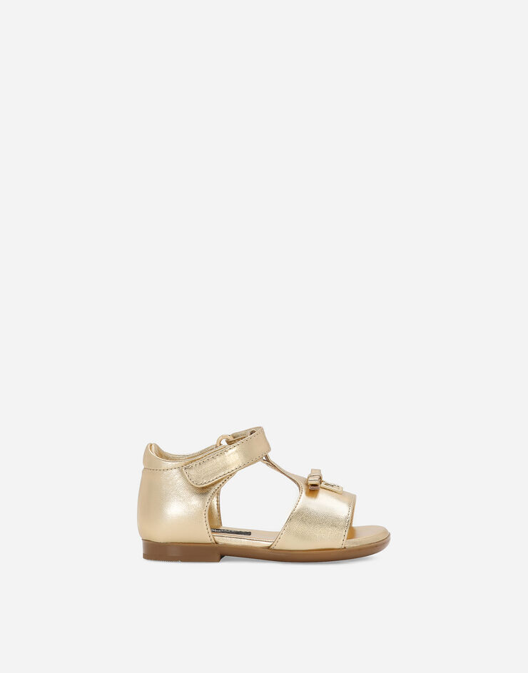 Foiled leather First Steps sandals in Gold for