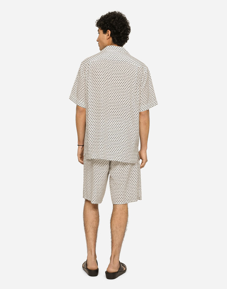 Dolce & Gabbana Crepe de chine jogging shorts with DG logo print White GV37ATIS1RF