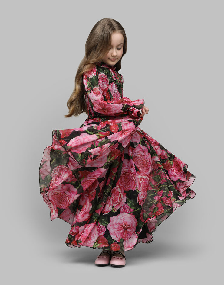 Dolce & Gabbana Kleid aus Georgette mit Rosenprint auf schwarzem Grund Drucken L54DA5IS1WE