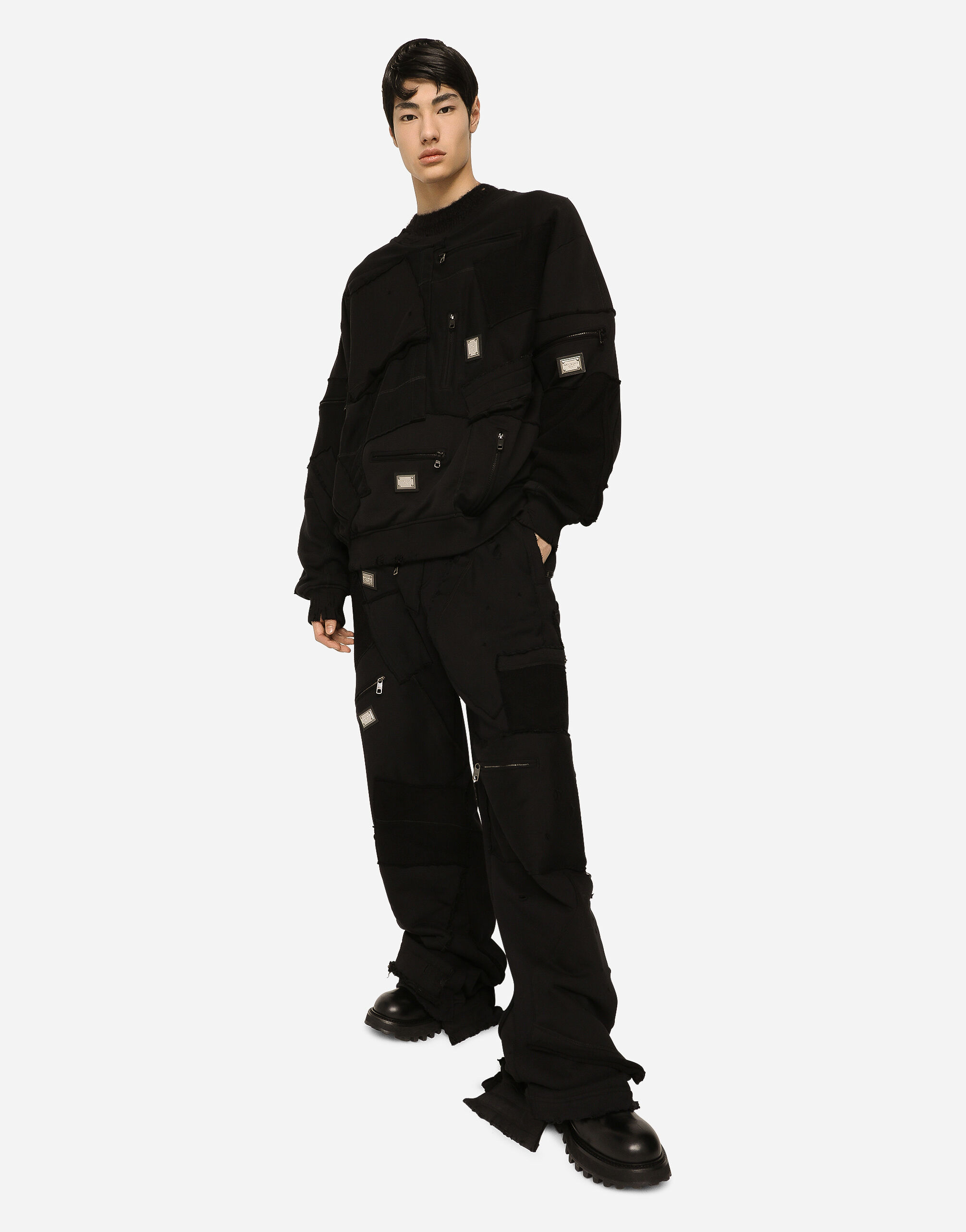 Patchwork jersey jogging pants with logo tag in Black for