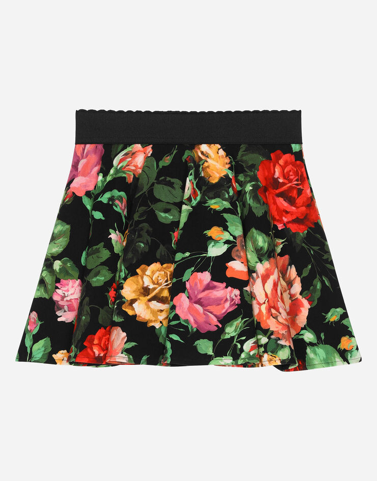 Dolce & Gabbana Interlock skirt with rose print over a black background Print L54I67FSG9A