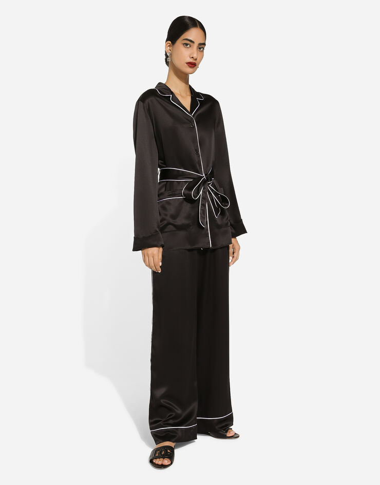 Dolce & Gabbana Chemise de pyjama en soie avec passepoil contrastant Noir F5N53TFU1AU