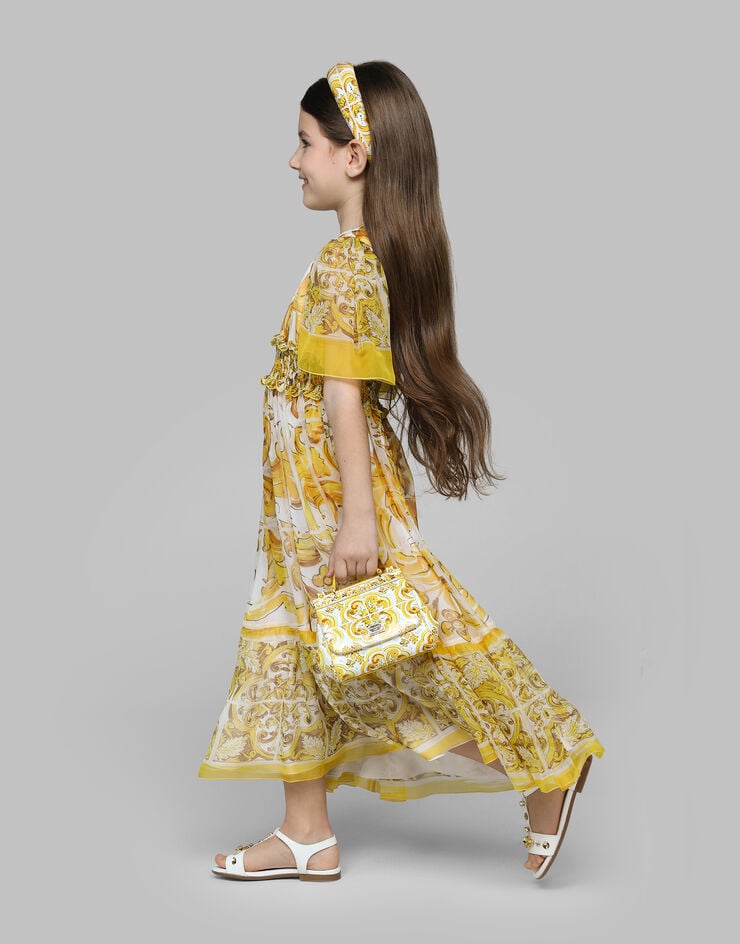 Dolce & Gabbana فستان شيفون بطبعة ماجوليكا صفراء مطبعة L53DW5HI1UF