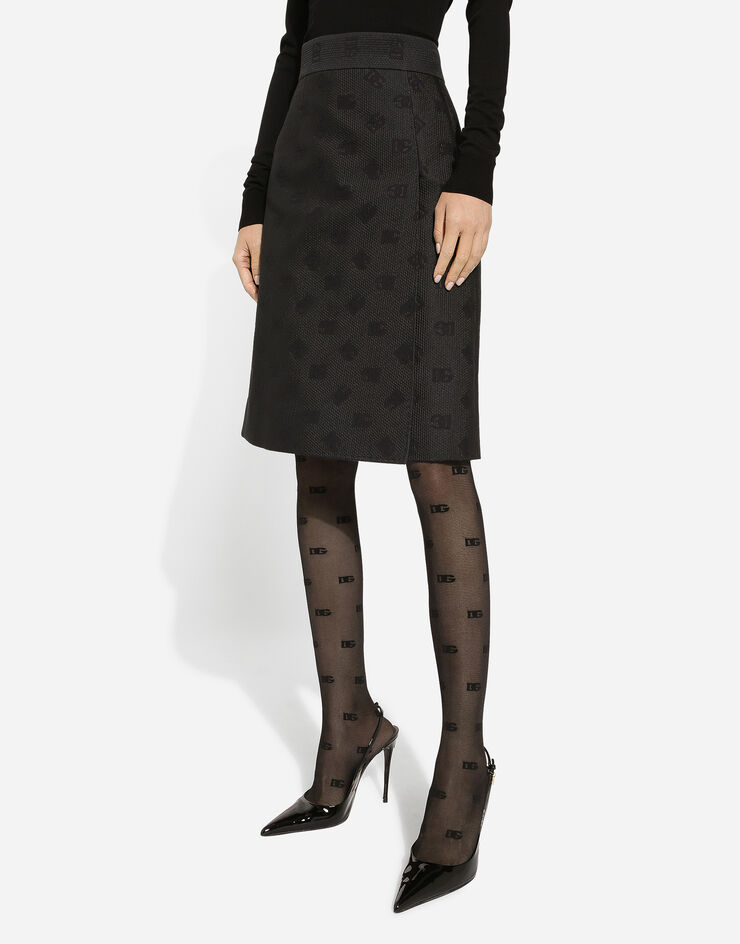 Dolce & Gabbana Jupe midi en jacquard matelassé à logo DG Noir F4CJ2THJMOW