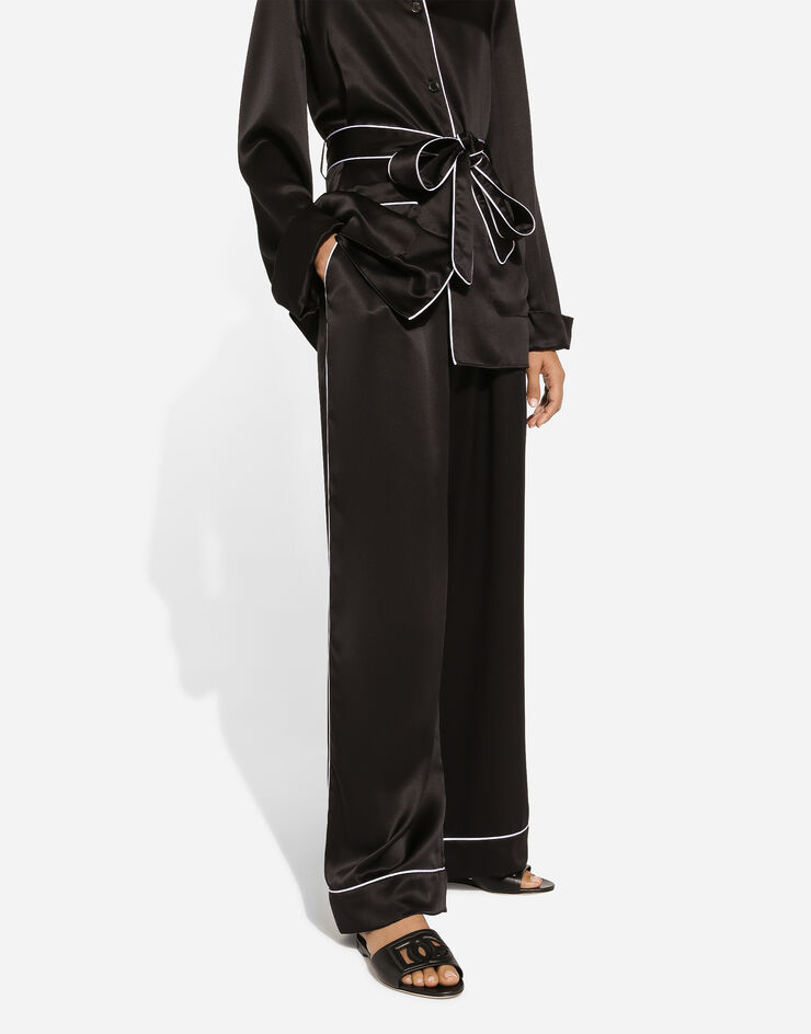 Dolce & Gabbana Chemise de pyjama en soie avec passepoil contrastant Noir F5N53TFU1AU