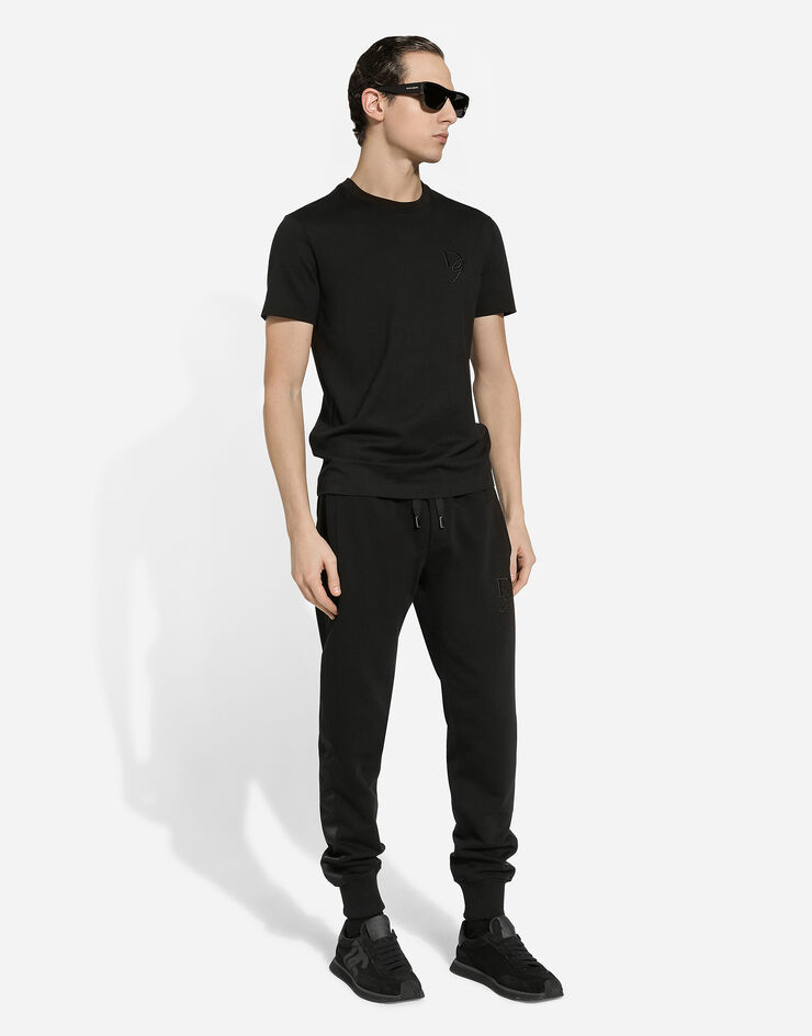 Dolce & Gabbana Pantalon de jogging en coton stretch à broderie DG Noir GP0F9ZG7N4R