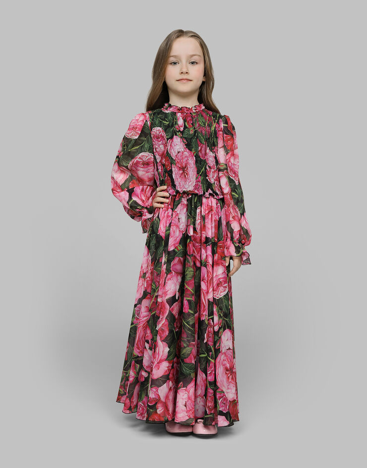 Dolce & Gabbana Kleid aus Georgette mit Rosenprint auf schwarzem Grund Drucken L54DA5IS1WE