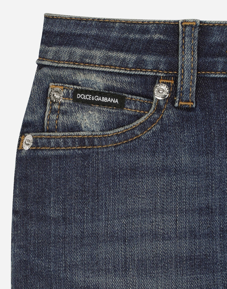 Dolce & Gabbana 5-Pocket-Jeansrock mit dreidimensionalen Blumen und Logoplakette Blau L53I42LDC82