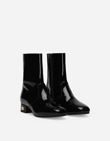 Dolce & Gabbana Bottines en cuir verni avec talon à logo Noir D11276A1328