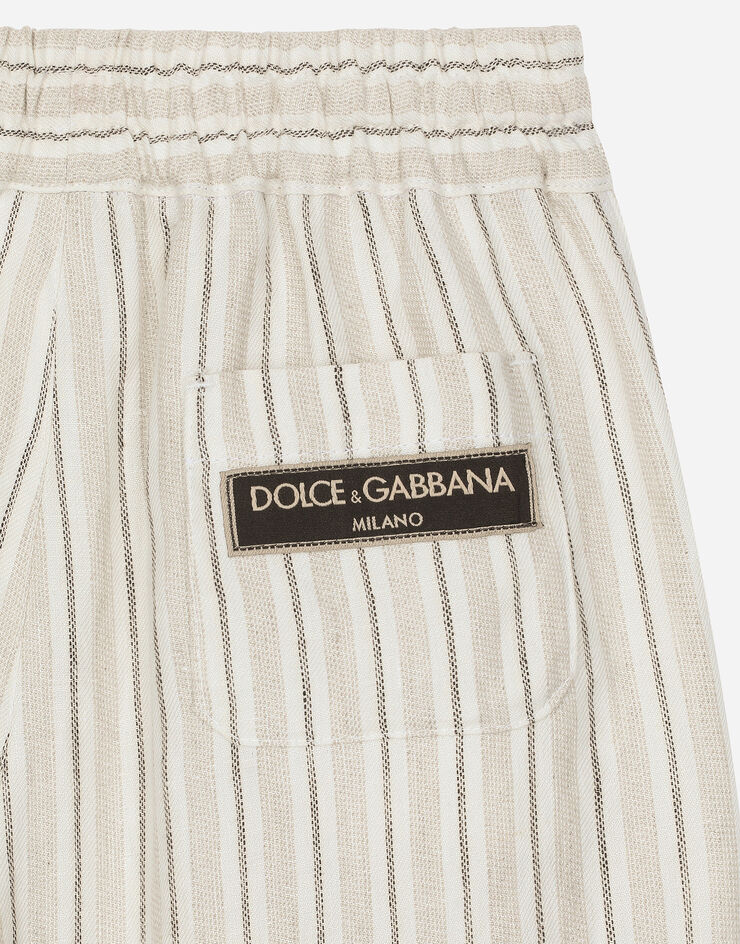 Dolce & Gabbana Льняные бермуды с фирменным лейблом разноцветный L43Q49FR4BY