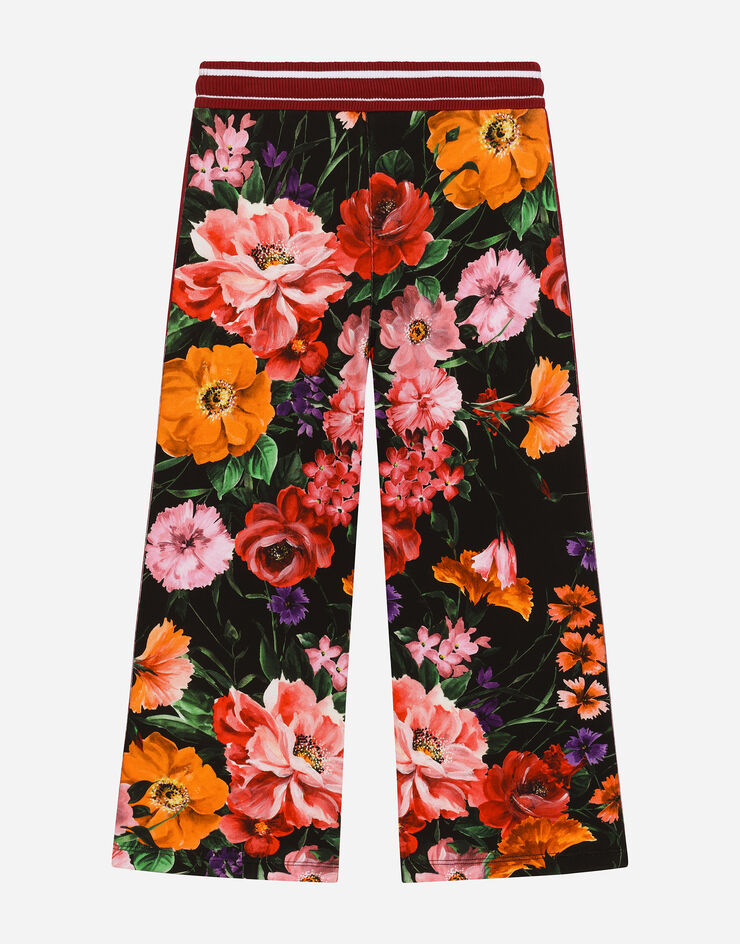 Dolce & Gabbana Pantalón de chándal de punto con estampado de flores sobre base negra Imprima L5JPE9HS7O4