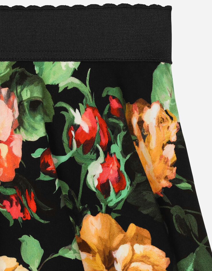 Dolce & Gabbana Interlock skirt with rose print over a black background Print L54I67FSG9A