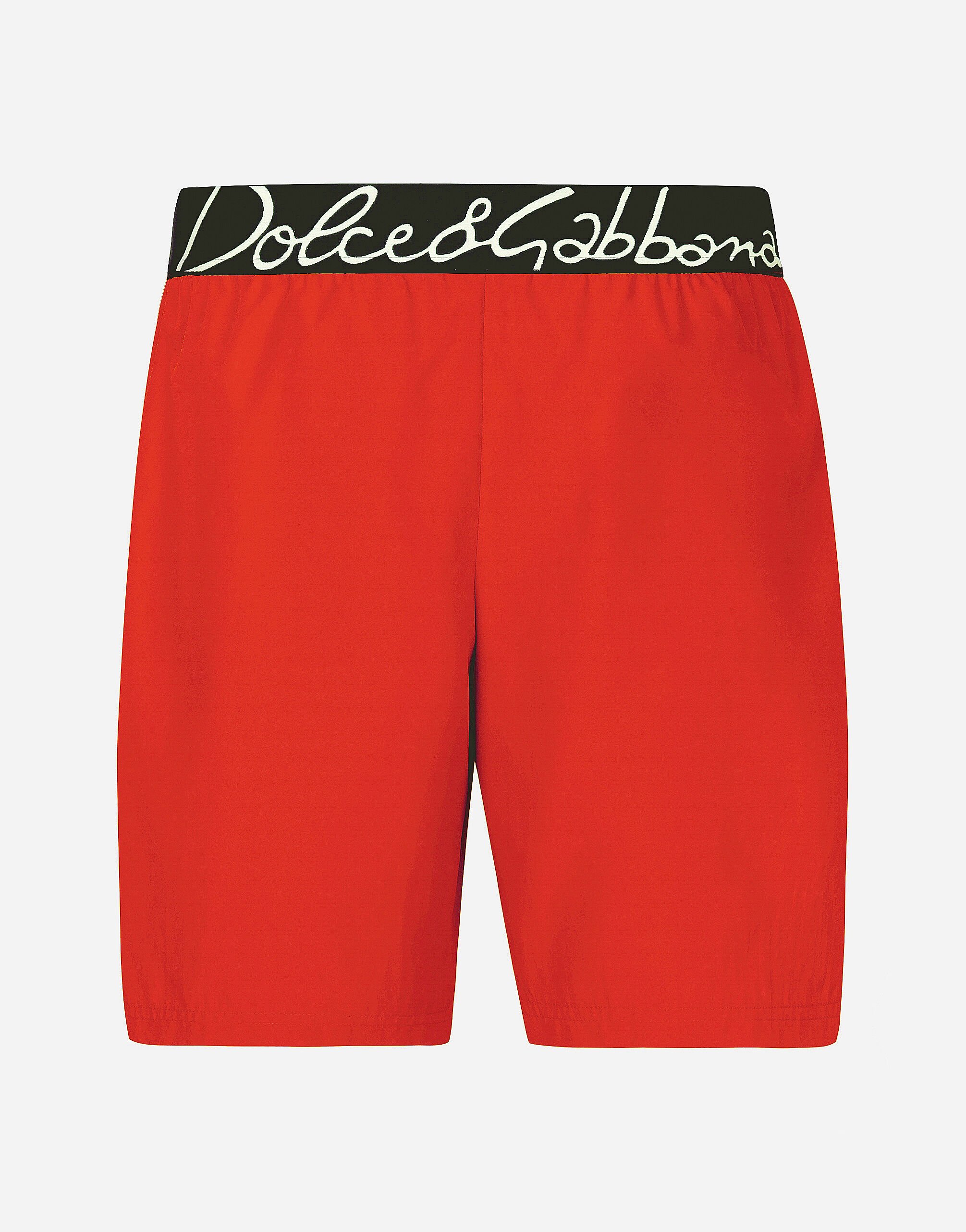 ${brand} Mid-length swim trunks with Dolce&Gabbana logo ${colorDescription} ${masterID}