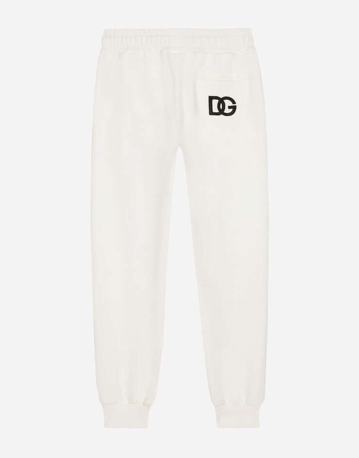 Jersey jogging pants with DG logo band in White for