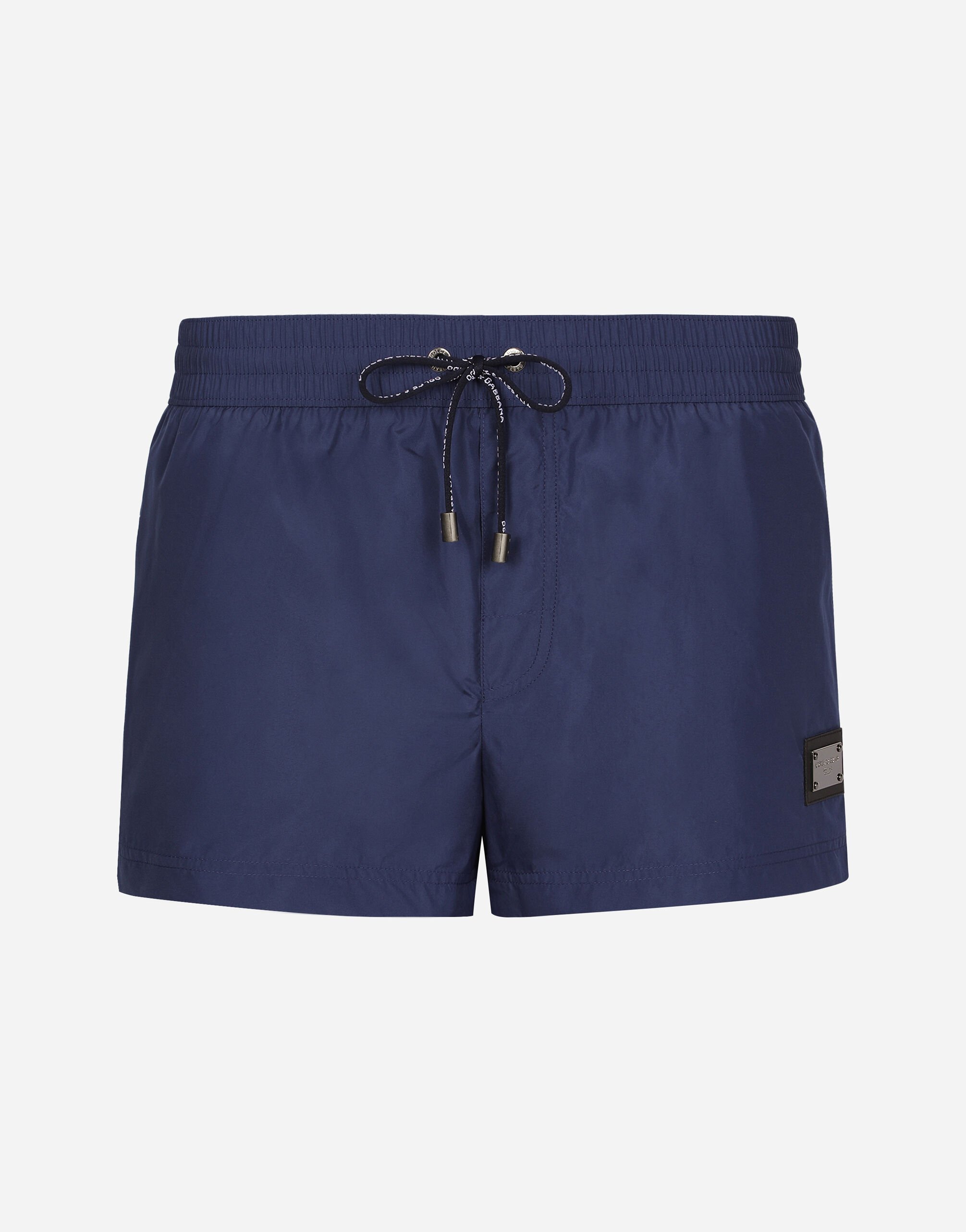 ${brand} Short swim trunks with branded tag ${colorDescription} ${masterID}