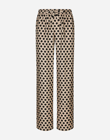 Dolce & Gabbana Pantalon de jogging en soie avec imprimé à pois et logo DG Multicolore G2NW0TFU4L0