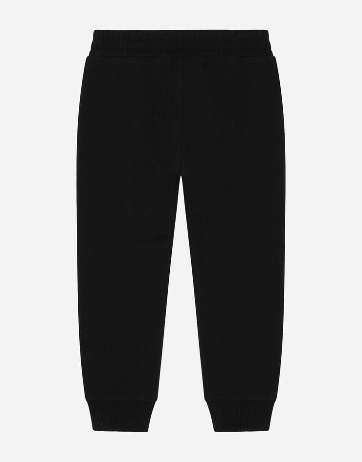 Dolce & Gabbana Jersey jogging pants with logo patch Negro L5JPD7G7M4V