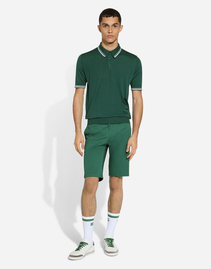 Dolce & Gabbana قميص بولو حرير أخضر GXZ02TJBSJW