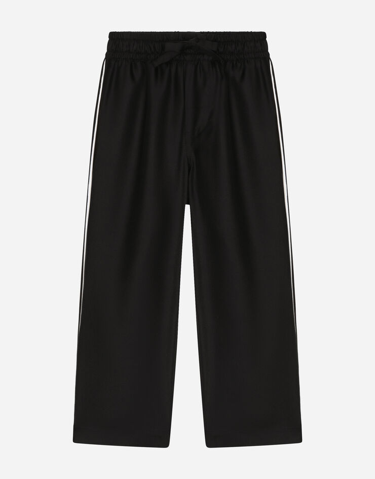 Dolce & Gabbana Pantalón tipo pijama en sarga de seda con DG bordado Negro L43P44G7H8Z