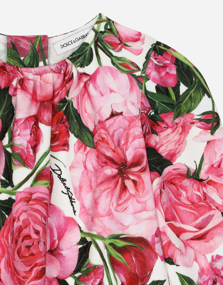 Dolce & Gabbana Kleid aus Interlock mit Rosenprint auf weißem Grund Drucken L2JD9GHS7O8