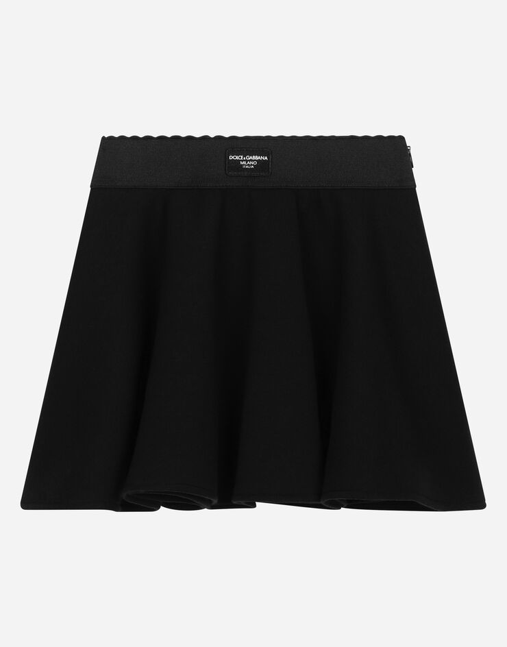 Dolce & Gabbana Pantalon en gabardine stretch avec plaquette à logo Noir L54I67G7M7I
