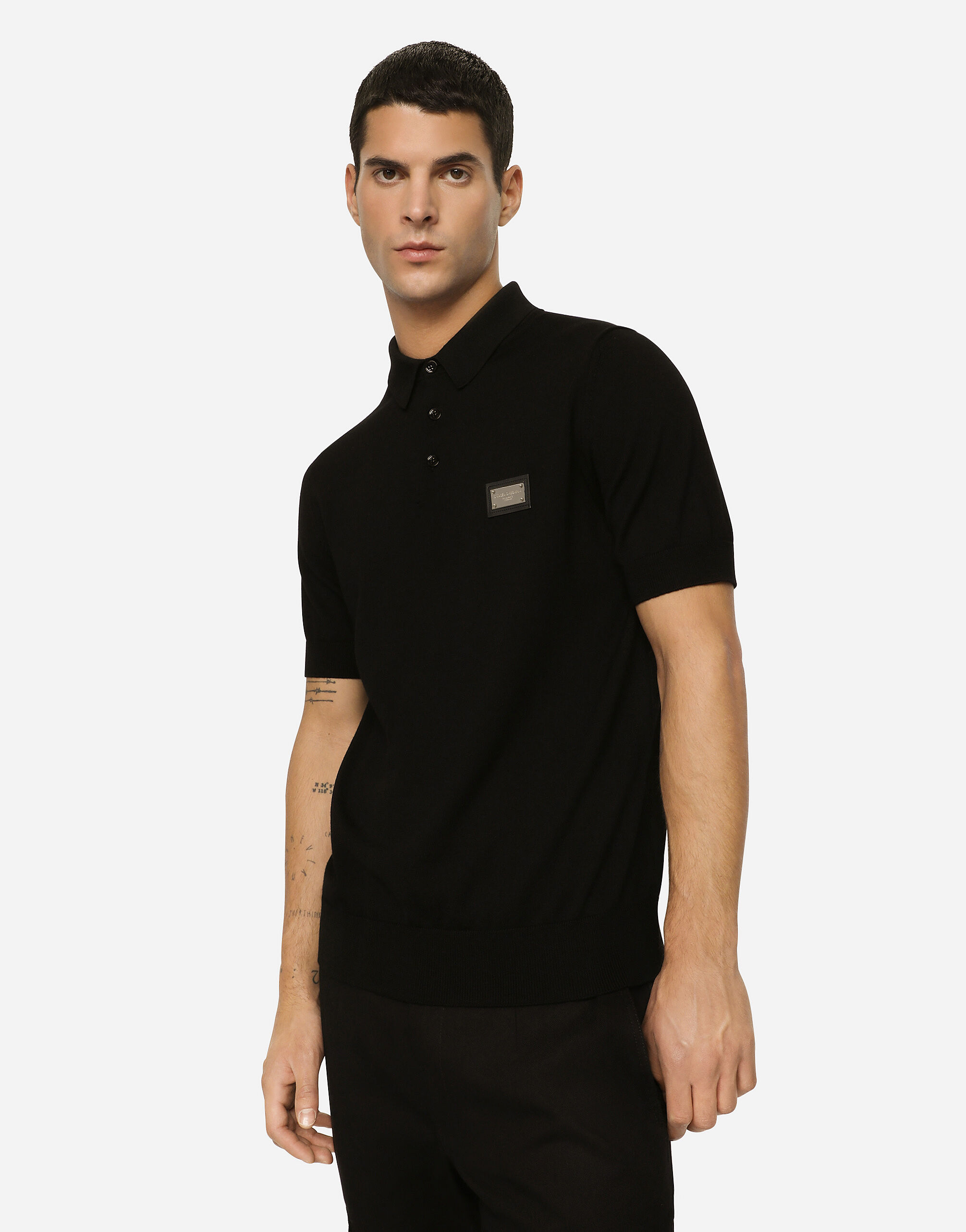 Wool polo-shirt with branded tag in Black for | Dolce&Gabbana® US