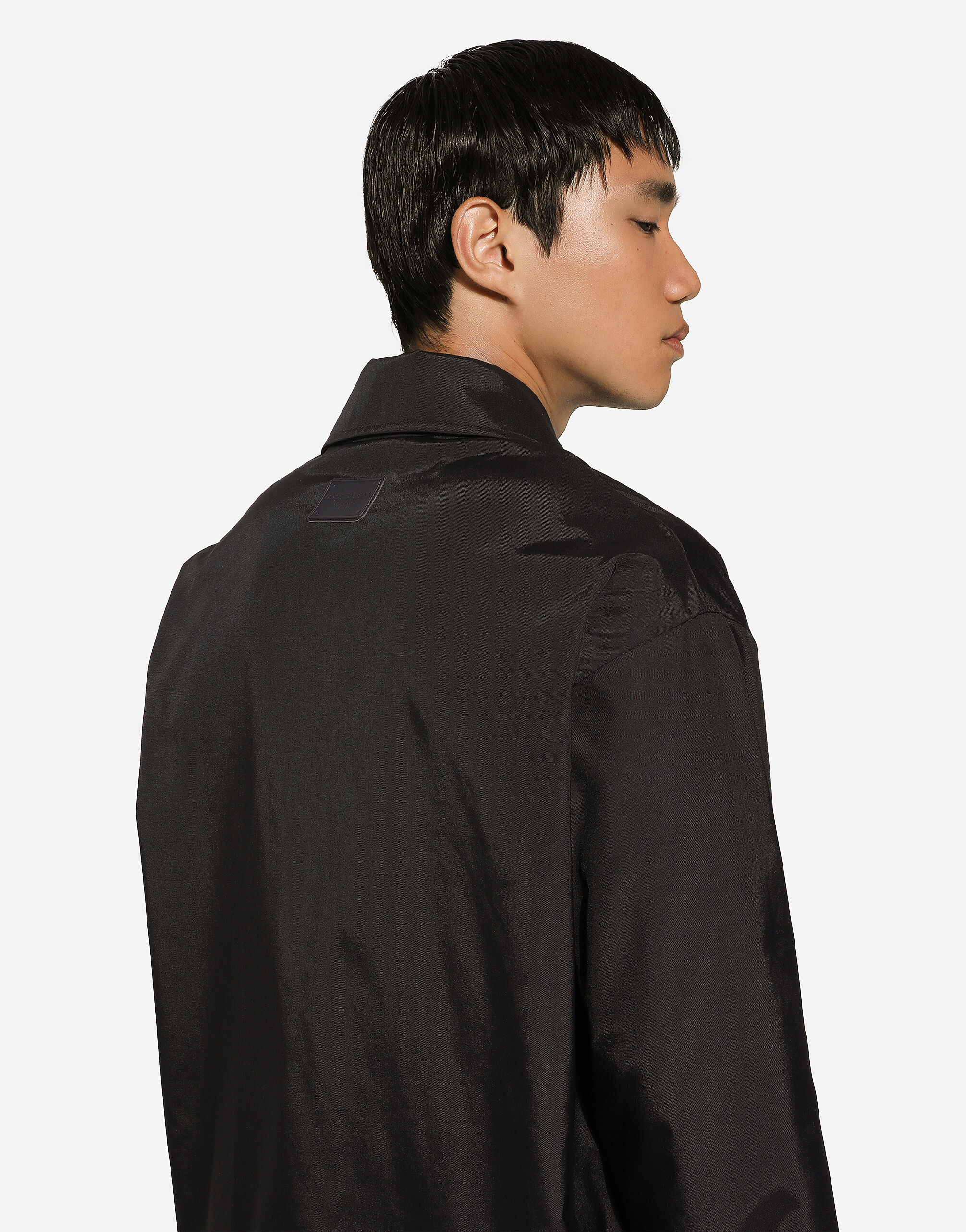 Technical fabric jacket with tag