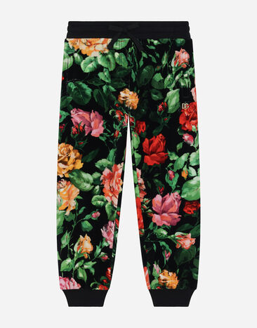 ${brand} Chenille jogging pants with rose print over a black background ${colorDescription} ${masterID}