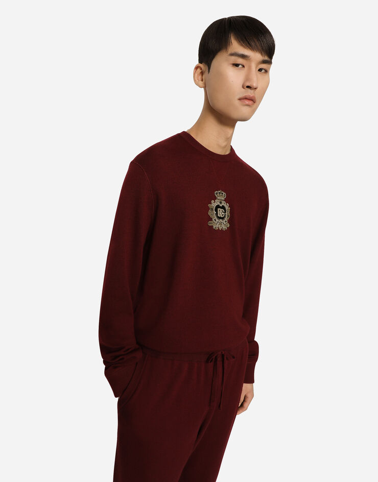 Dolce&Gabbana Cashmere and wool knit sweatshirt with DG patch Bordeaux GXQ12ZJFMQ2