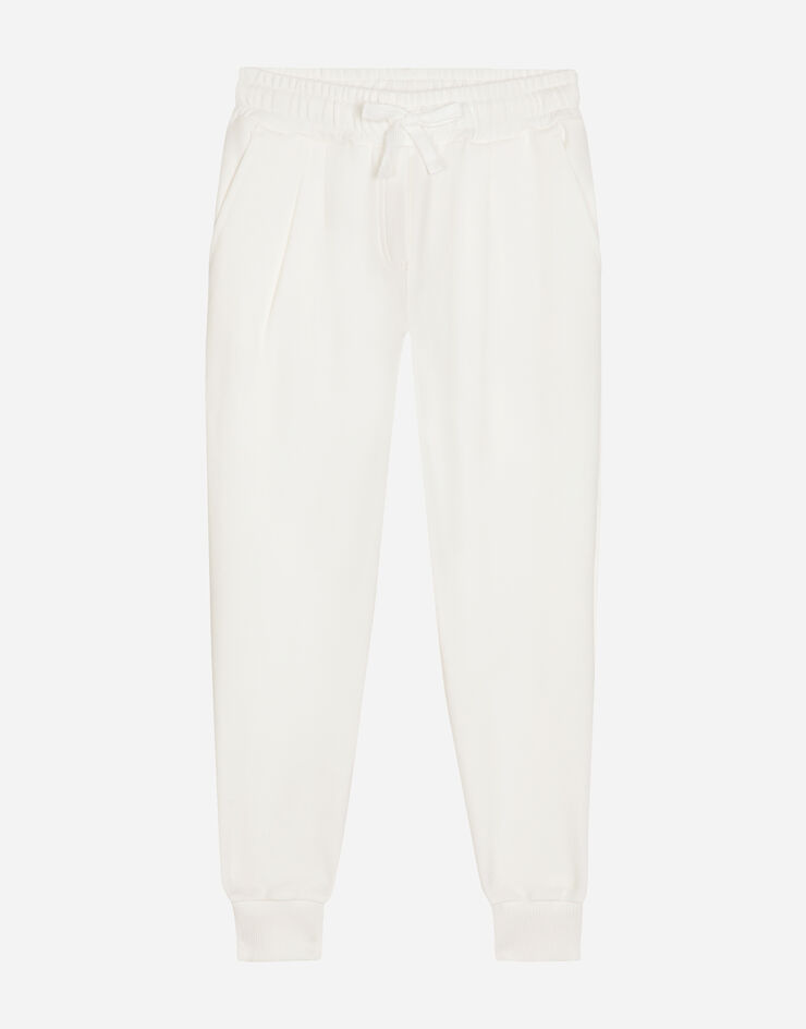 Jersey jogging pants with DG logo band in White for