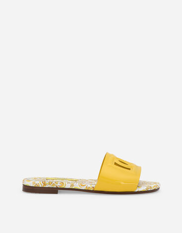 Dolce & Gabbana Patent leather sliders with yellow majolica print and cut-out DG detail Print L53DW3FI5JY