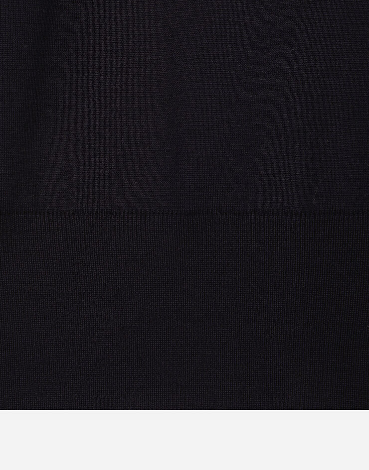 Dolce & Gabbana Pull ras de cou en laine vierge à logo DG Bleu GXX24ZJCVR3