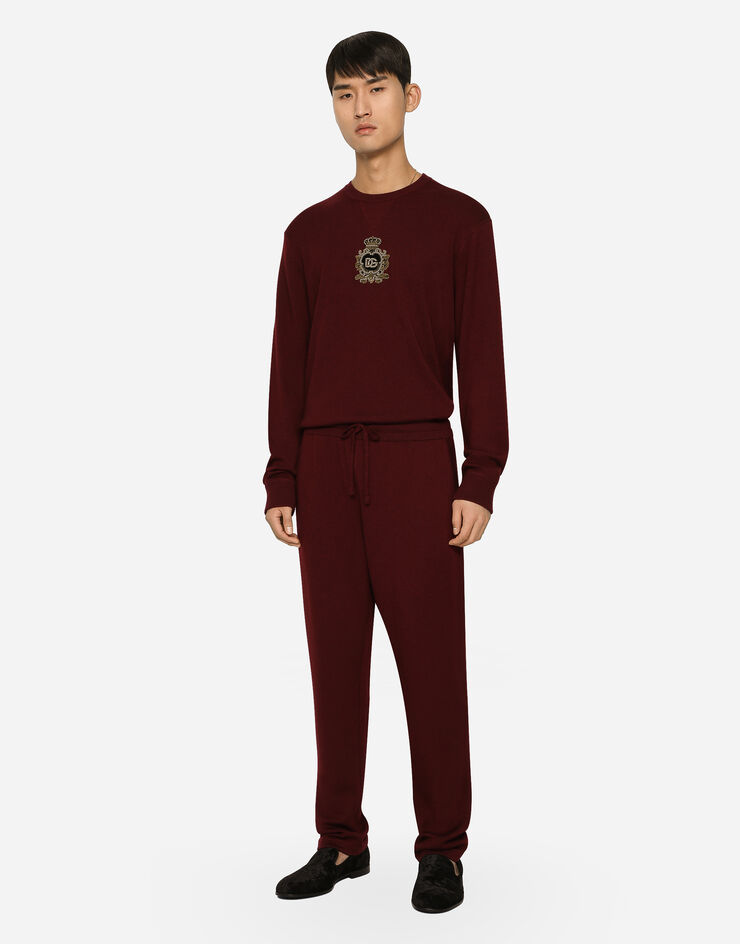 Dolce&Gabbana Strick-Sweatshirt aus Wolle und Kaschmir mit DG-Patch Burgunderrot GXQ12ZJFMQ2