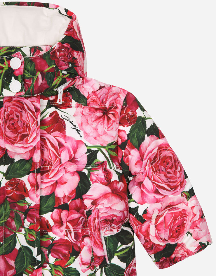 Dolce & Gabbana Short nylon down jacket with rose print over a white background Print L2JBQ6ISMID