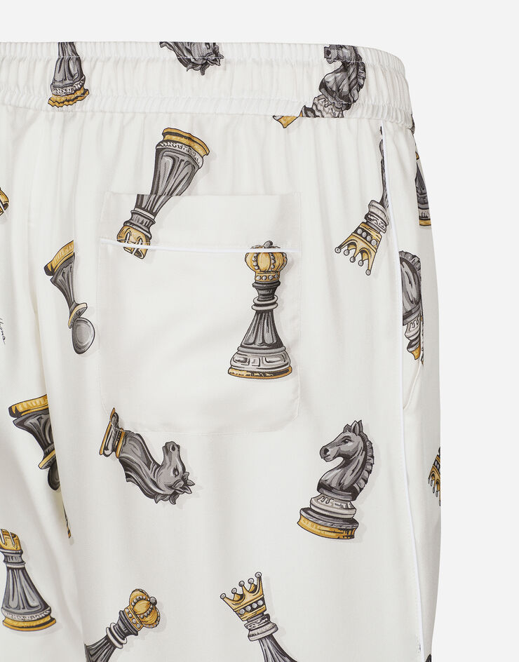 Dolce & Gabbana Silk twill jogging pants with chess-piece print Print GVCRATIS1VA