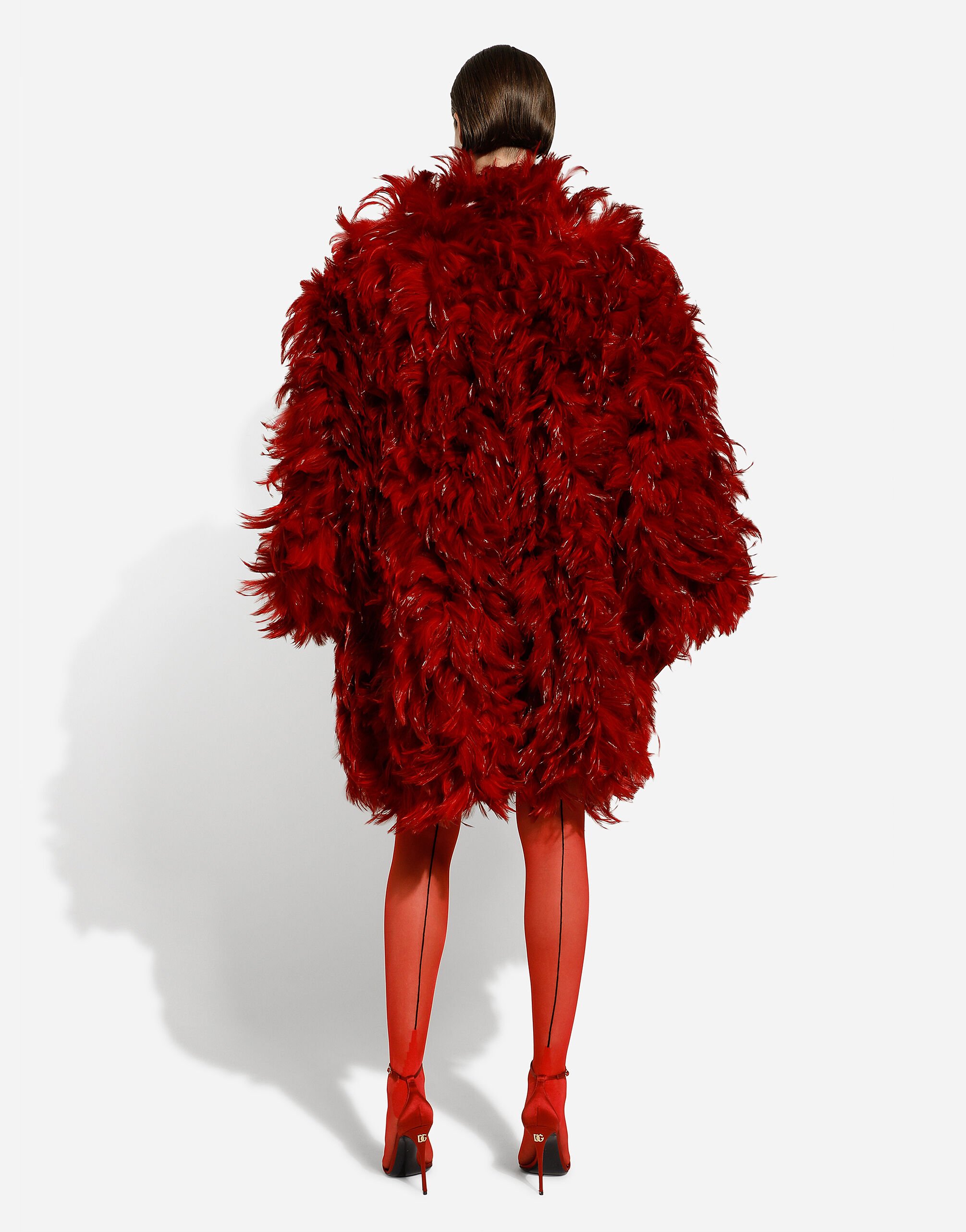 Organza coat with rooster feather embellishment
