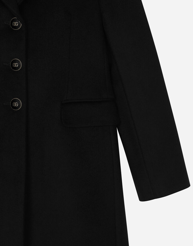 Dolce & Gabbana Manteau droit en laine avec boutons à logo Noir L53C15G7N4E