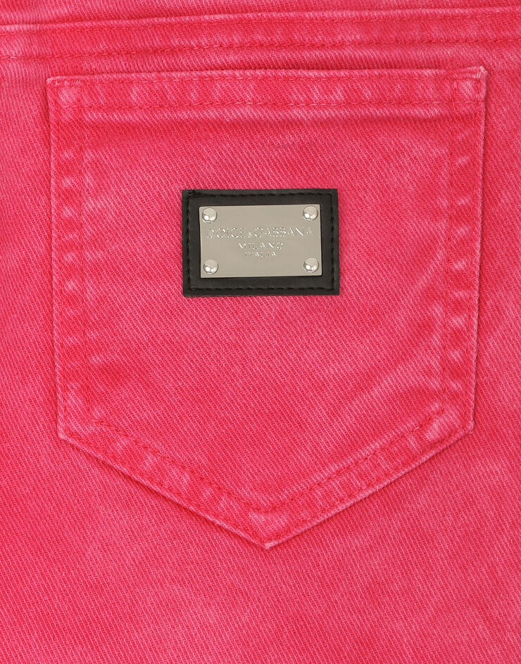 Dolce & Gabbana Jupe 5 poches en denim effet lavé avec plaquette à logo Multicolore L55I36LDC71