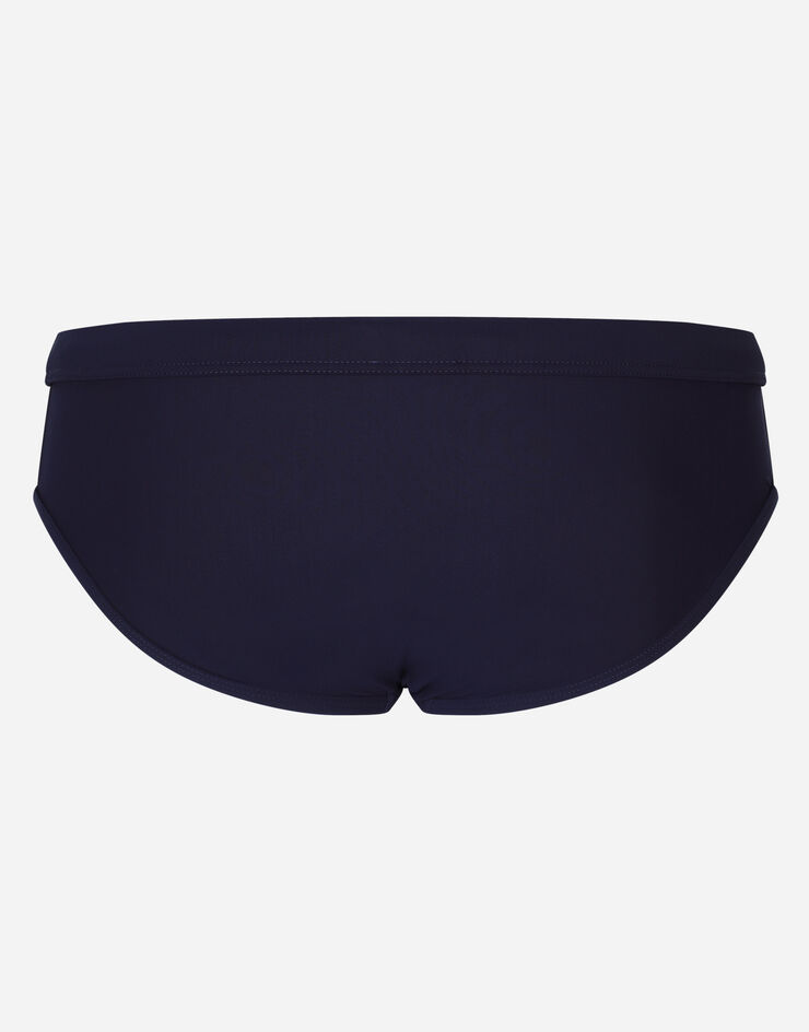 Dolce & Gabbana Slip de bain montant avec plaquette à logo Bleu M4A76JONO05