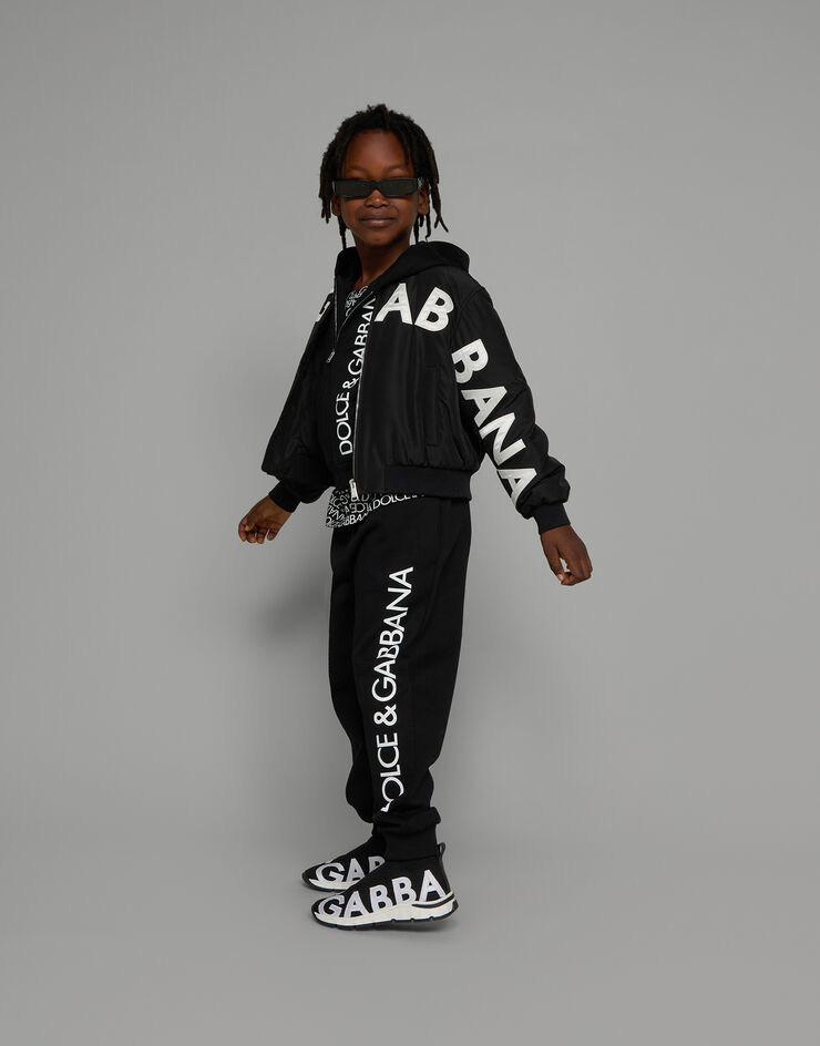 Cotton jogging pants with logo print in Black for Boys