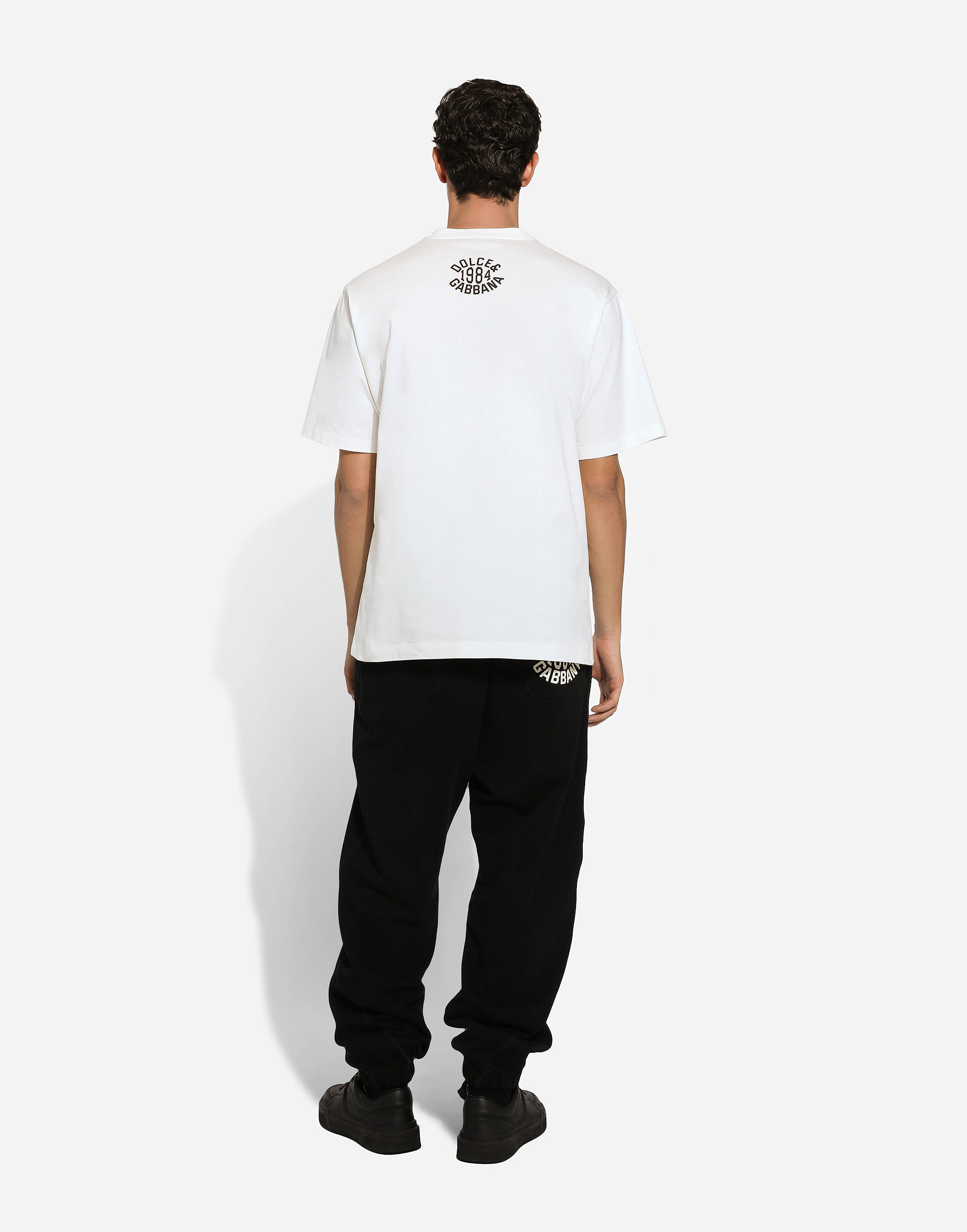 Shop Dolce & Gabbana Jersey Jogging Pants With Dolce&gabbana Print In ブラック