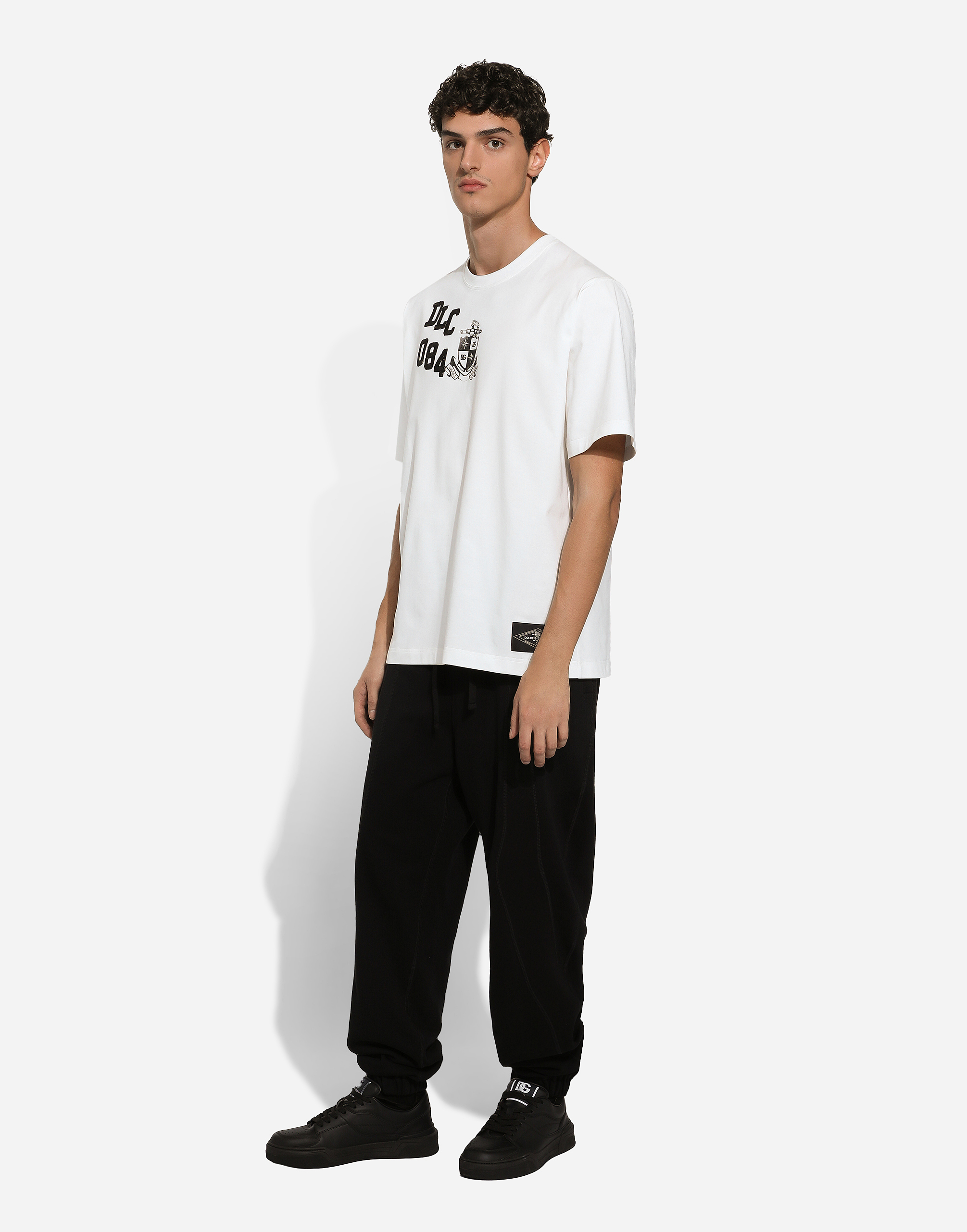 Shop Dolce & Gabbana Jersey Jogging Pants With Dolce&gabbana Print In ブラック