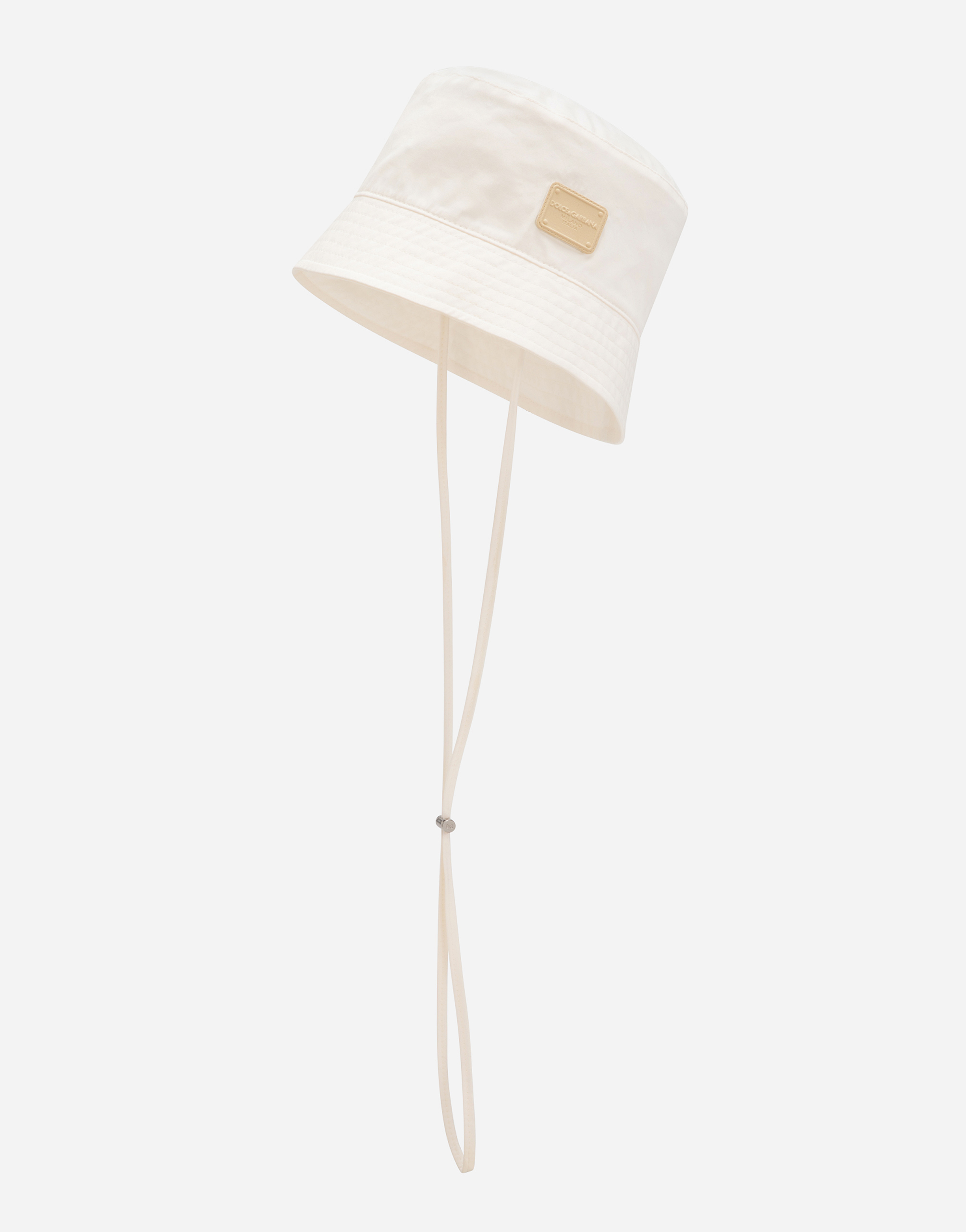 Shop Dolce & Gabbana Bucket Hat With Branded Tag In ベージュ