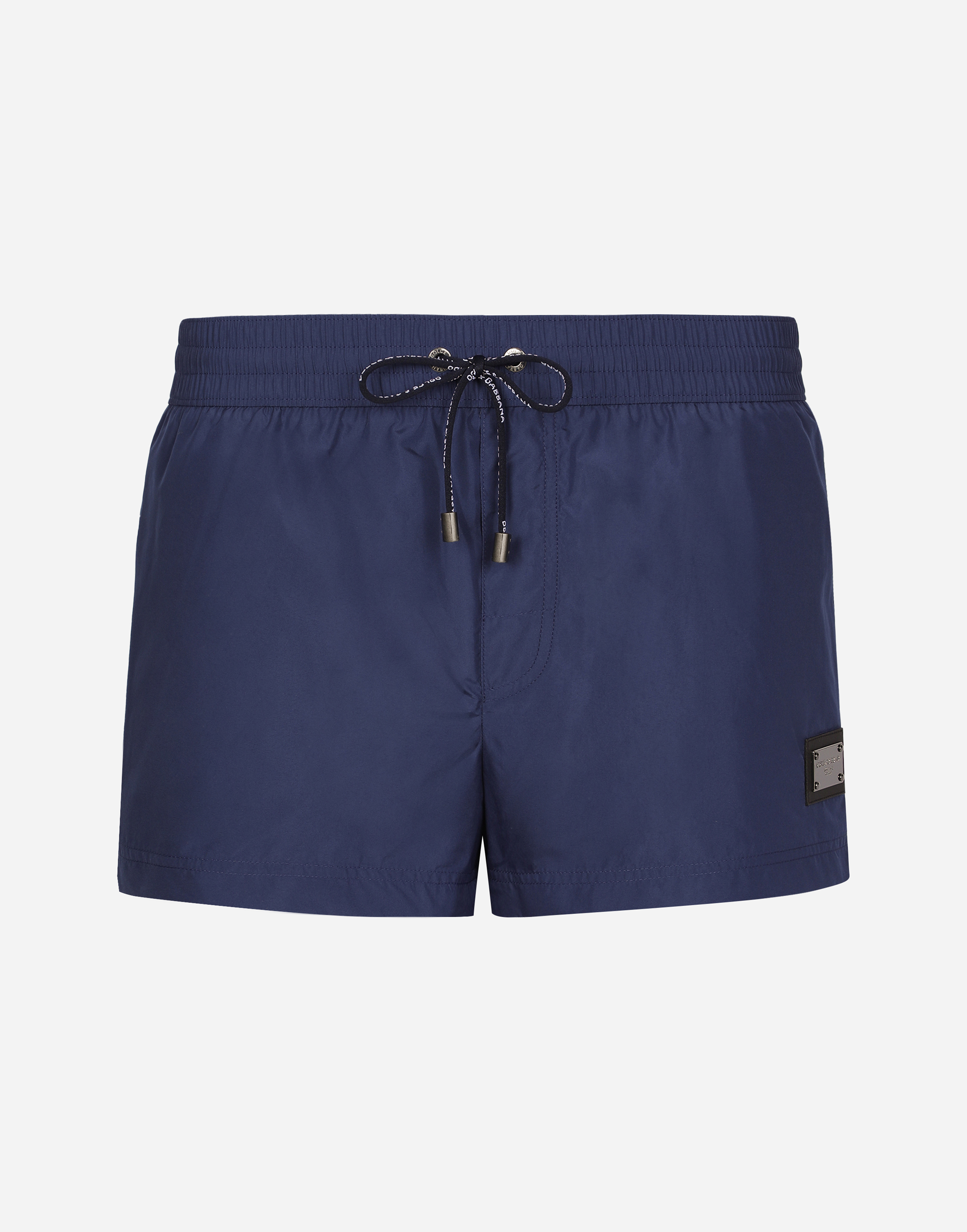 Short swim trunks with branded tag