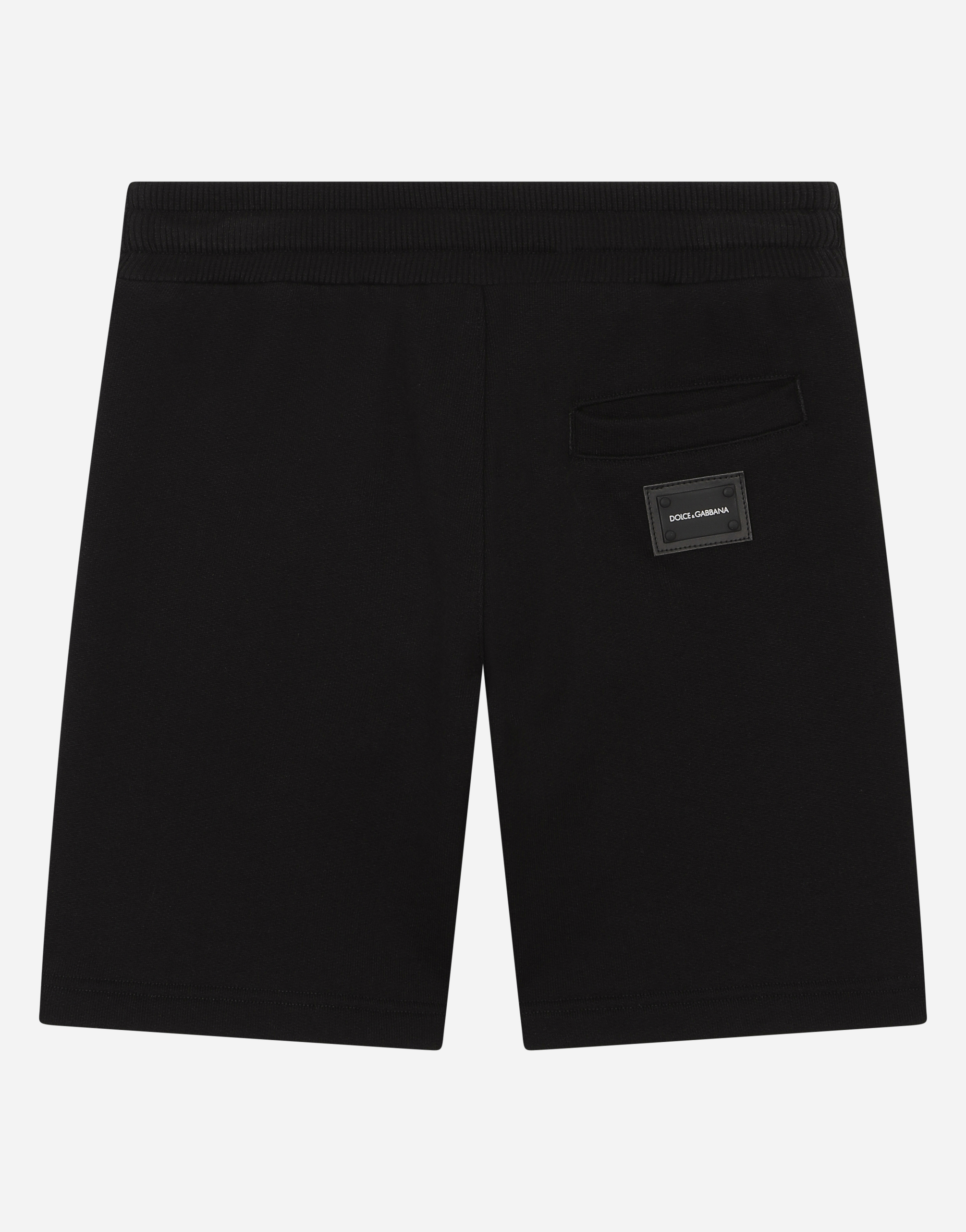 Jersey jogging shorts with logo plate